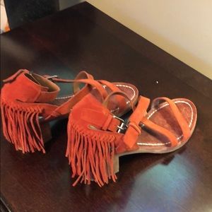 Rust colored suede sandal with fringe